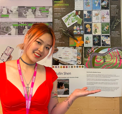 Huilin Shen presenting the Community Gardens Forres graduation display.